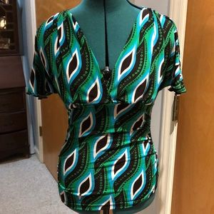 Patterned blue and green short sleeved top.